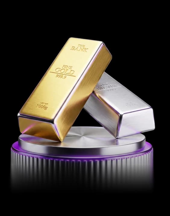 Gold and silver bullion bars on a display pedestal